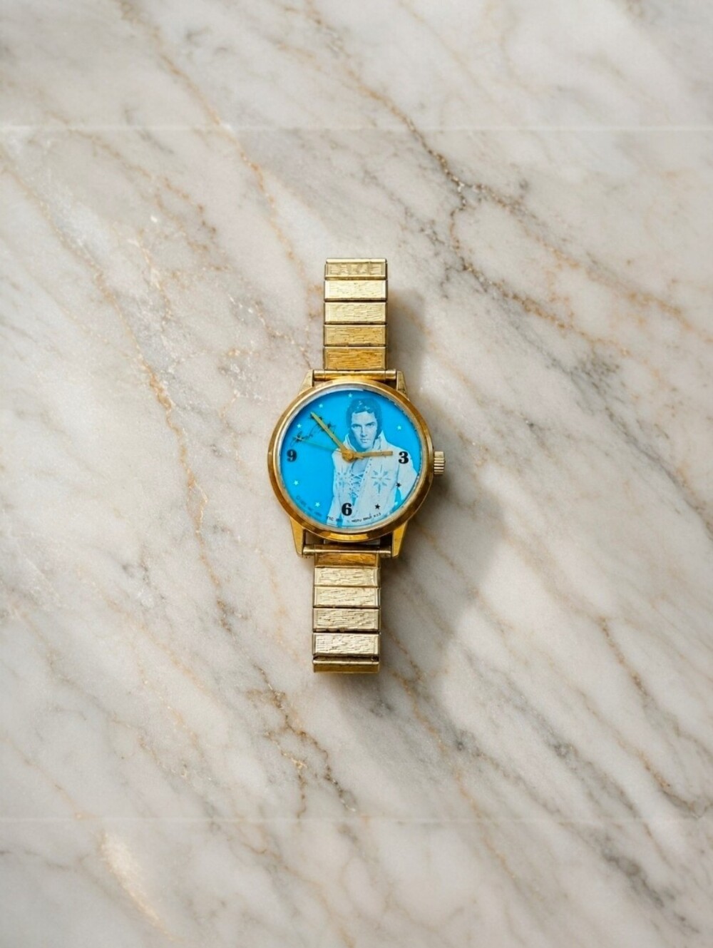 Vintage 1977 Elvis Presley commemorative wristwatch with expansion band